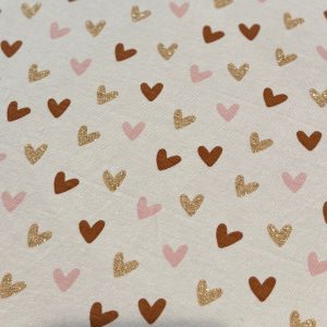 tissu jersey paillette coeur marron et rose pour création artisanale de culottes