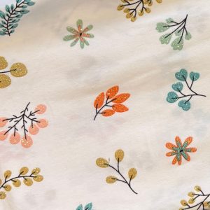 tissu jersey paillette fleurs orange et bleu pour création artisanale de culottes
