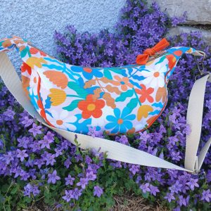 Sac demi-lune artisanal fleurs pop multicolores fait main